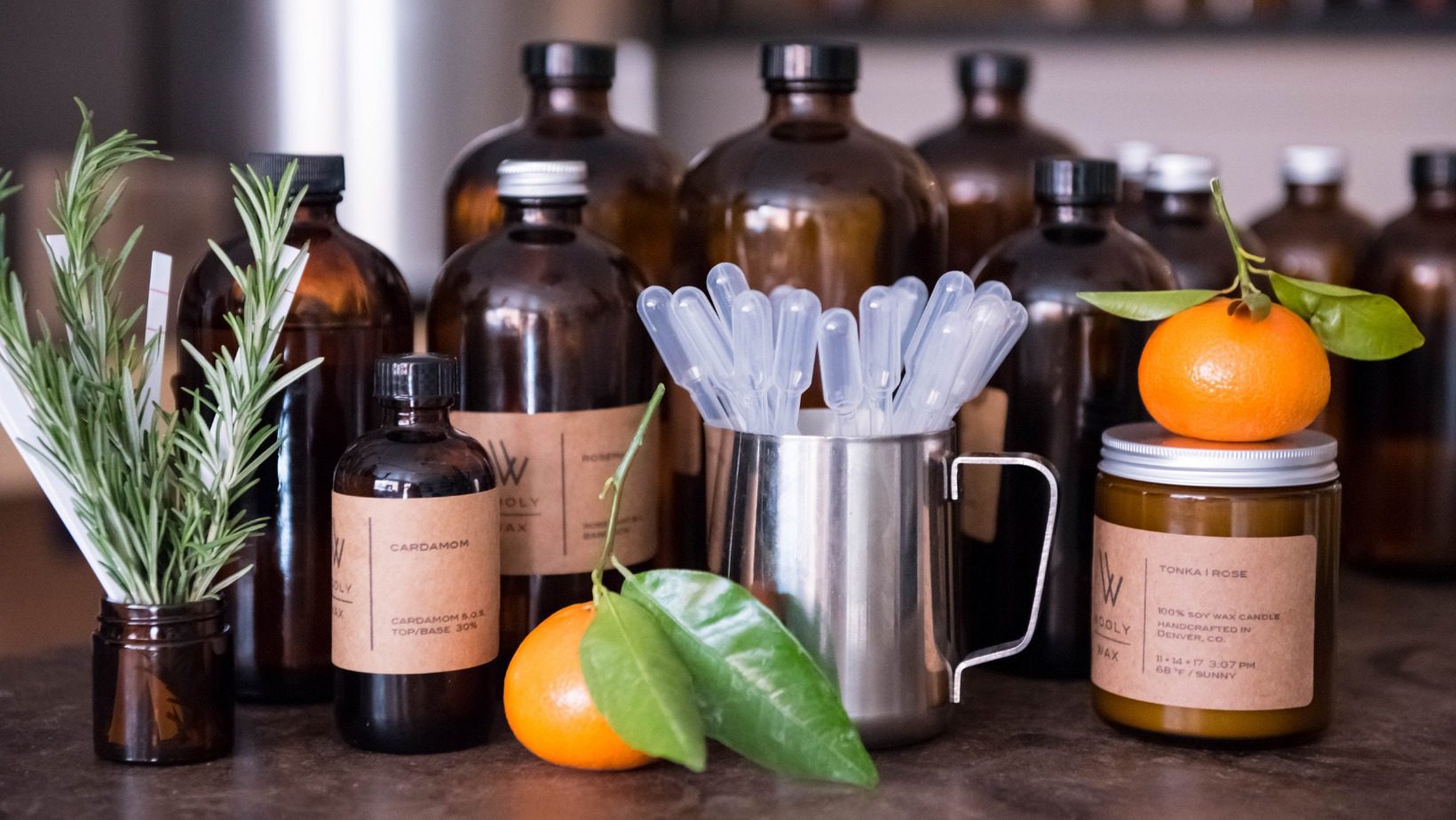 an assortment of candles and scents offered at wooly wax